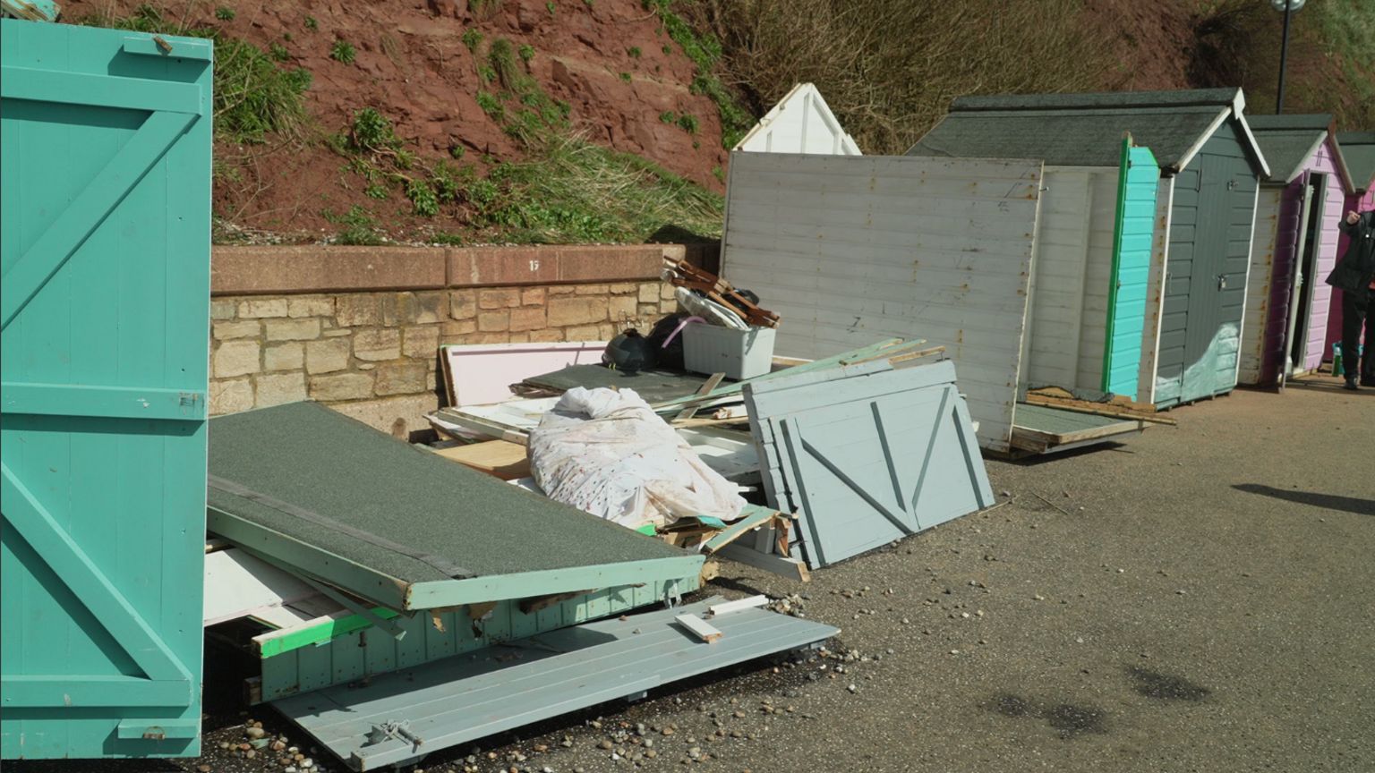Destroyed beach huts in Seaton
