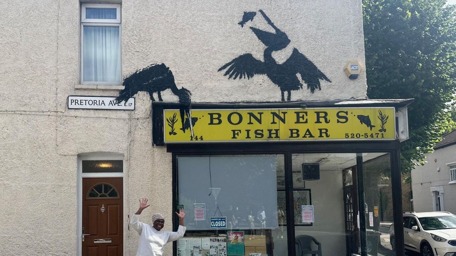 Marcia McKnight, in front of Banksy's pelicans 