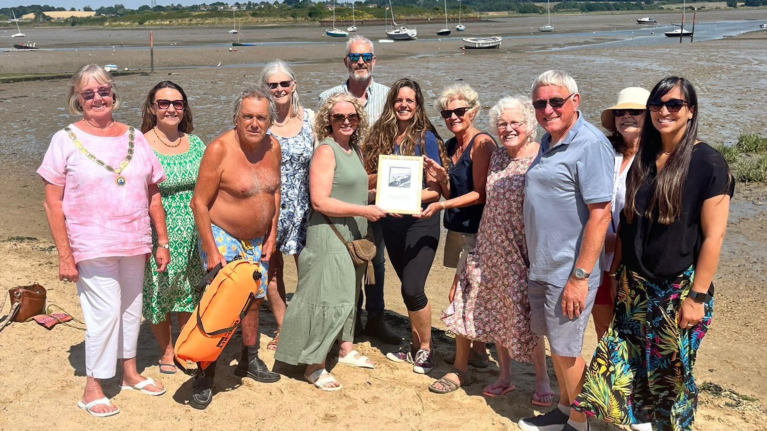 The Manningtree Mermaids being presented their award