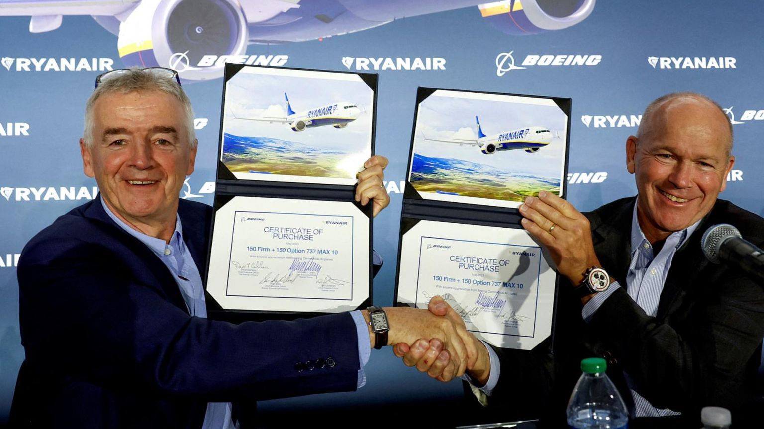 Ryanair Chief Executive Michael O'Leary and Boeing Chief Executive Dave Calhoun sign a multibillion-dollar deal for as many as 300 Boeing jets at Boeing headquarters in Arlington, Virginia,