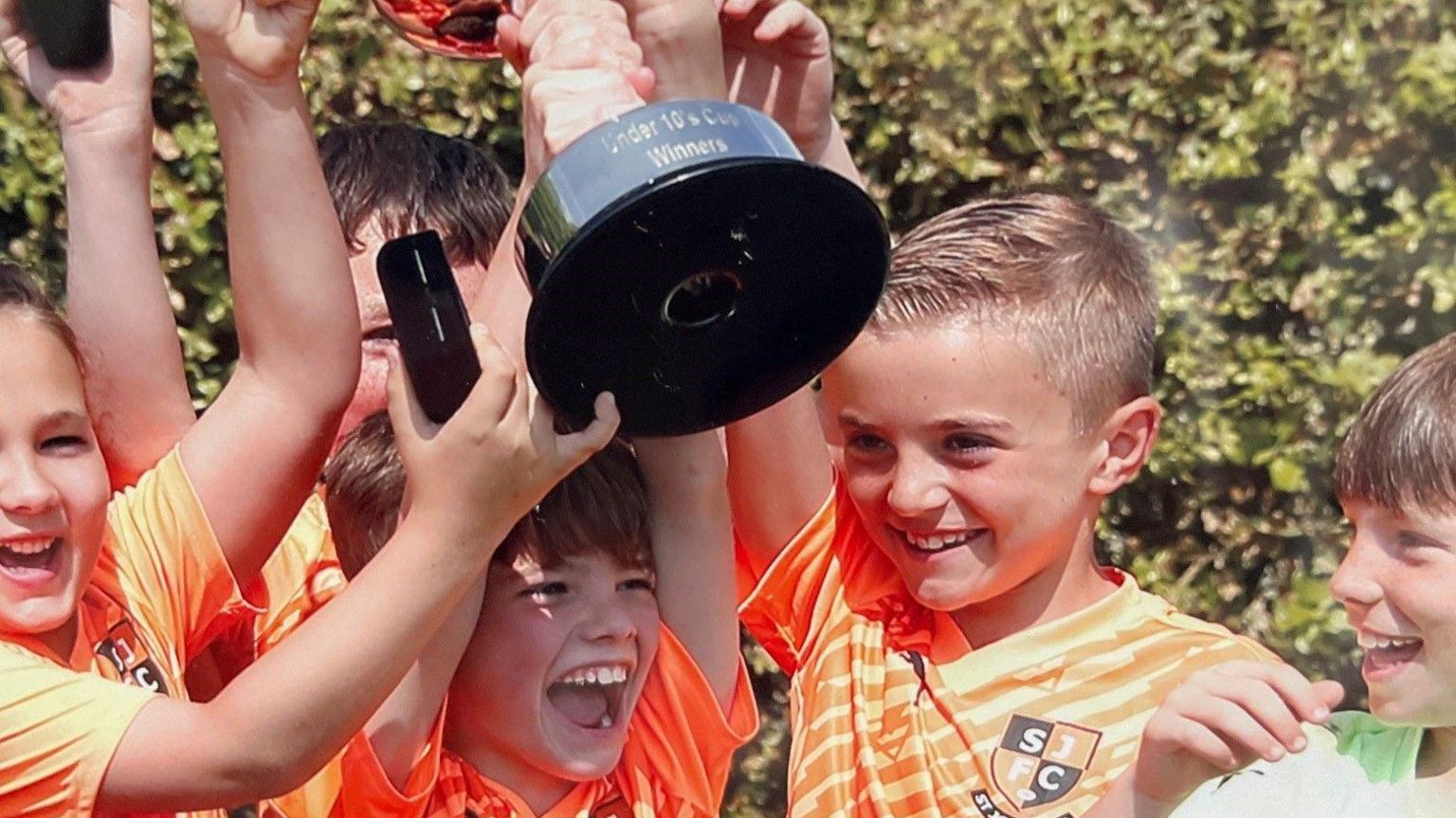 St Johns under 10s celebrate winning the Suffolk Youth Football League