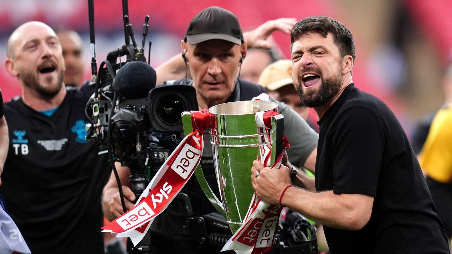 Russell Martin (right) celebrates Southampton's promotion