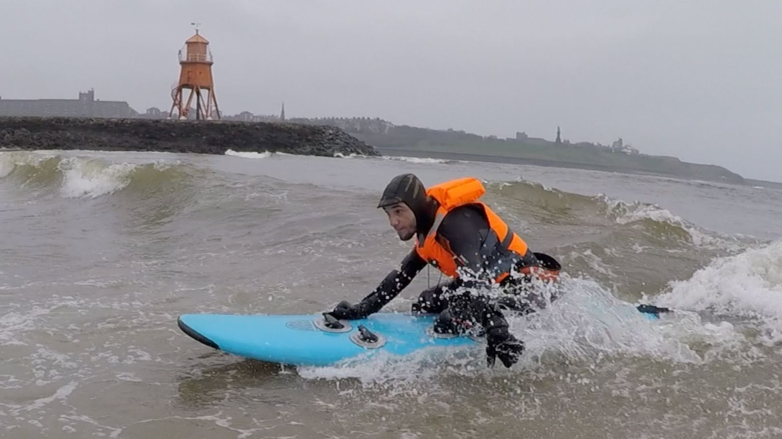 Jimmy on a surf board