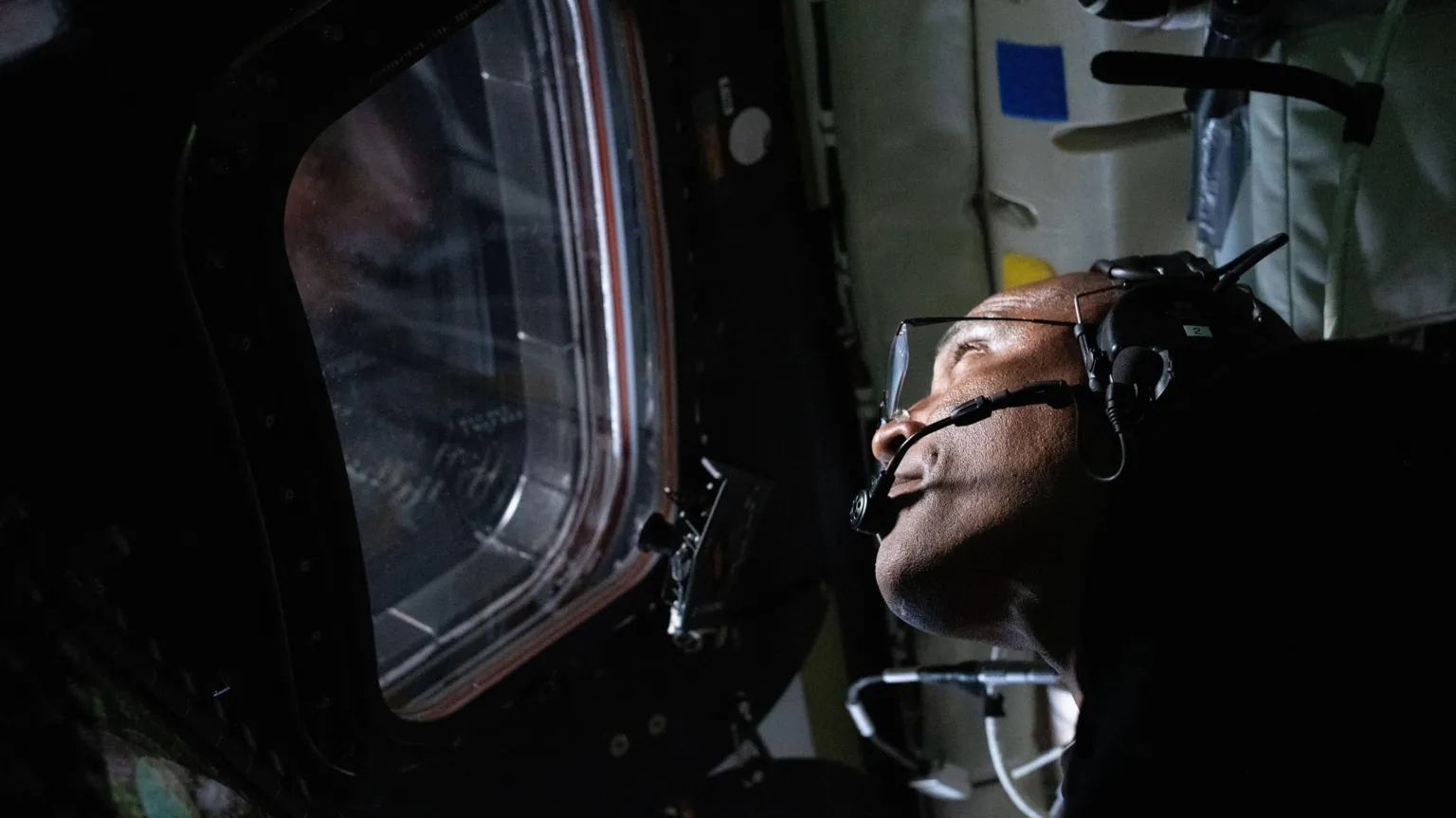 NASA  Victor Glover looks out of the window of the Orion spacecraft