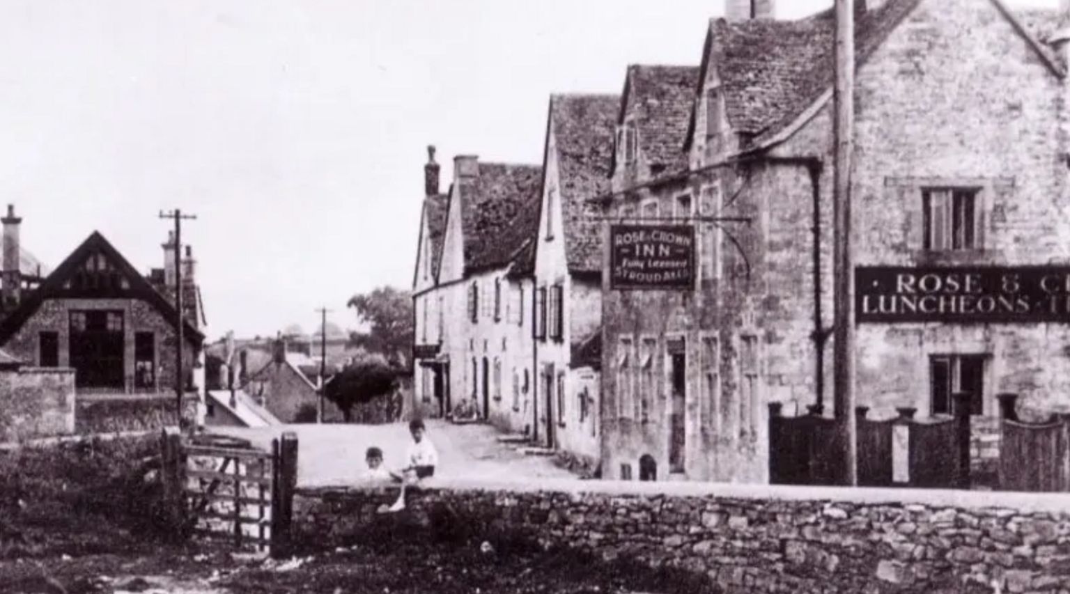 A black and white photo of the Rose and Crown