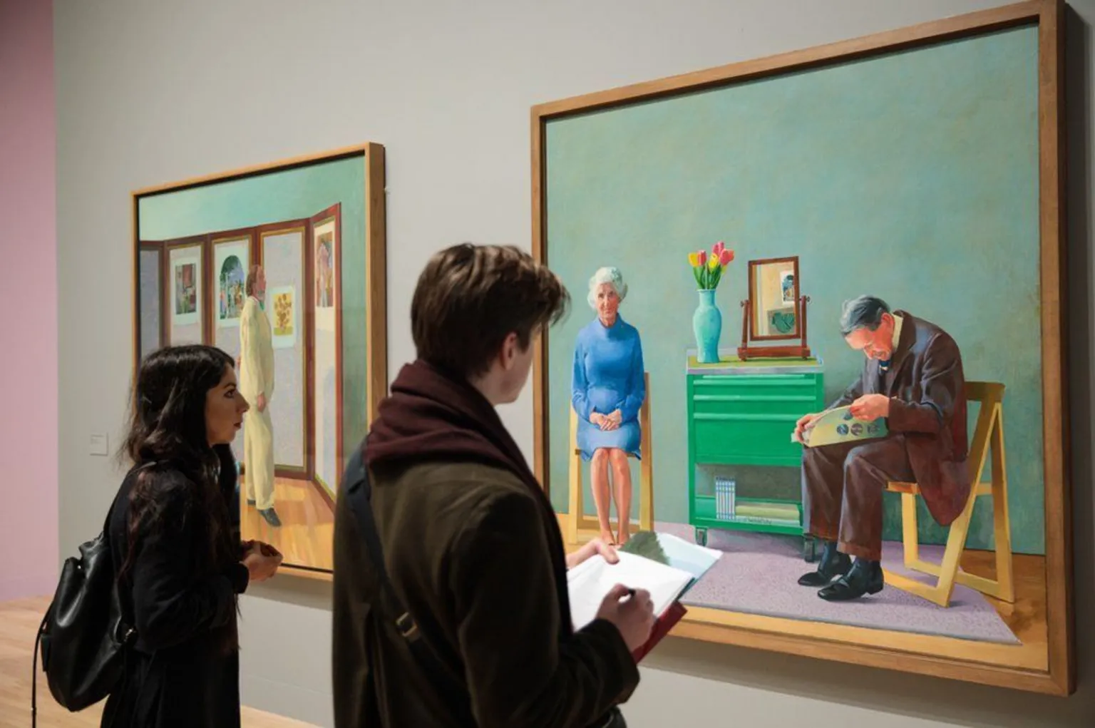 Getty Images David Hockney's painting of his parents.  This photo shows gallery goers looking at Hockney paintings.