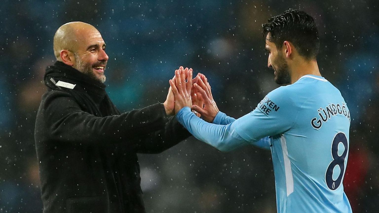 Pep Guardiola and Ilkay Gundogan celebrate together