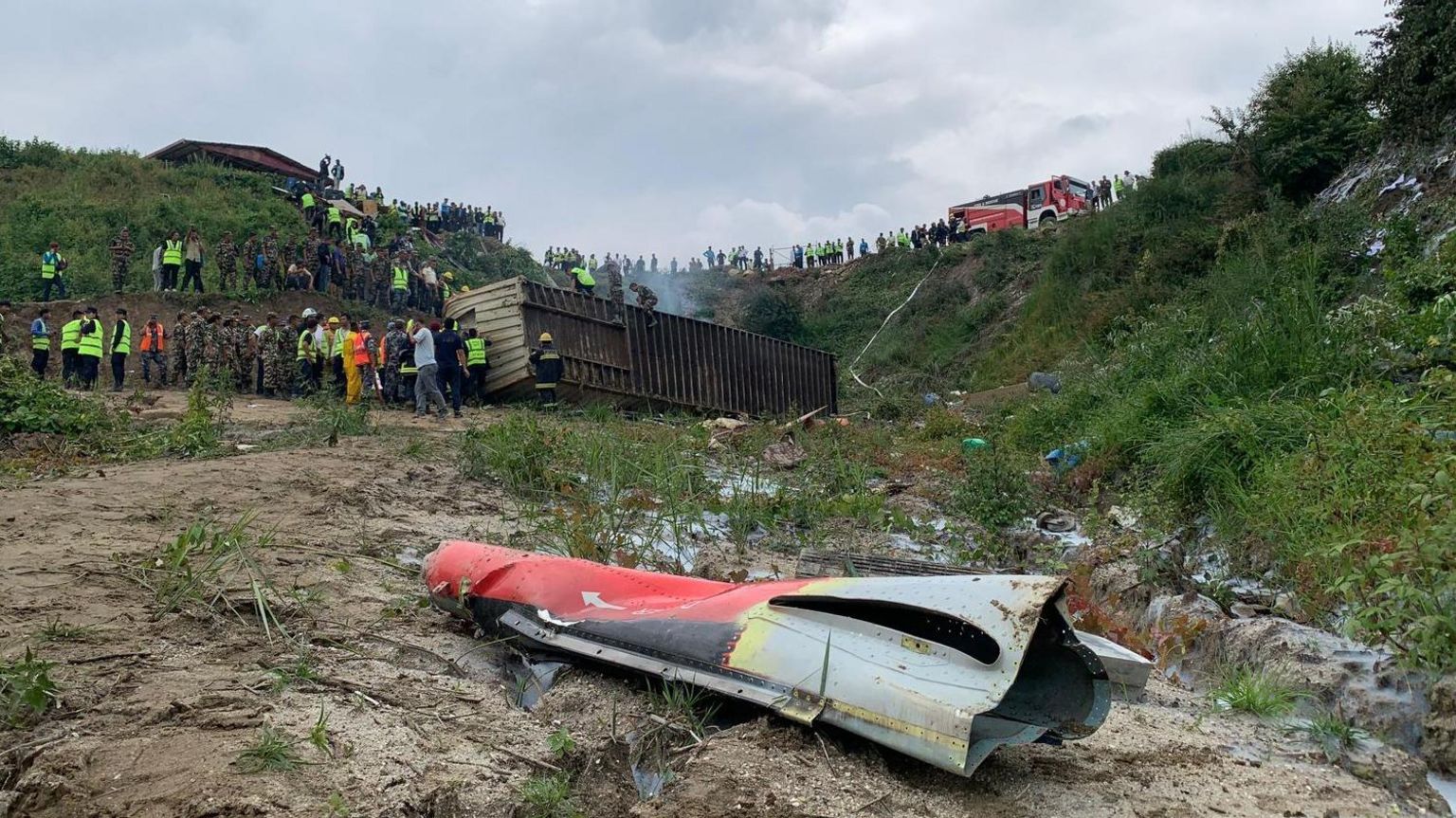 Freight container lies ruined in valley after plane crash