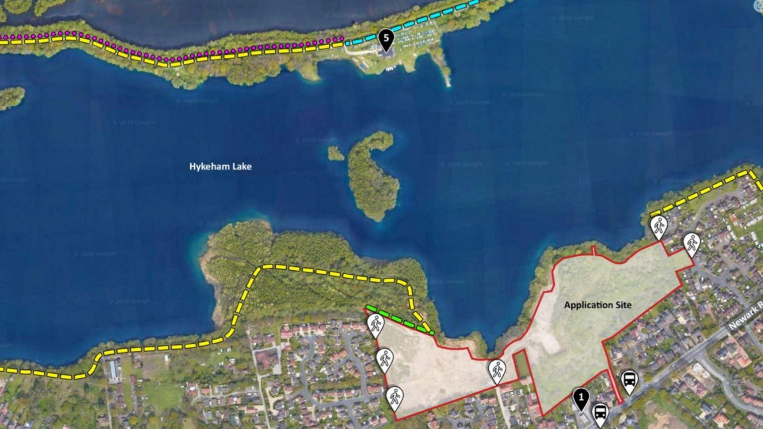 A CGI map with lines showing the 'application site'of North Hykeham where the homes will be built in between a housing estate and next to a lake