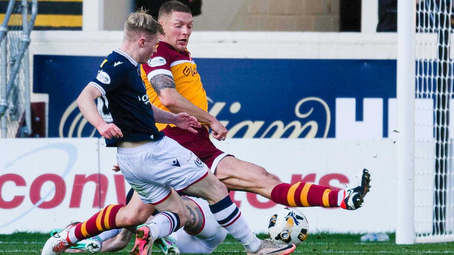 Dundee's Lyall Cameron scores to make it 1-0 during a William Hill Premiership match between Motherwell and Dundee at Fir Park, 