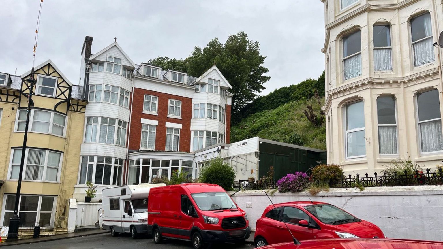 The white and red frontage of Seaview Hotel, Douglas, Isle of Man