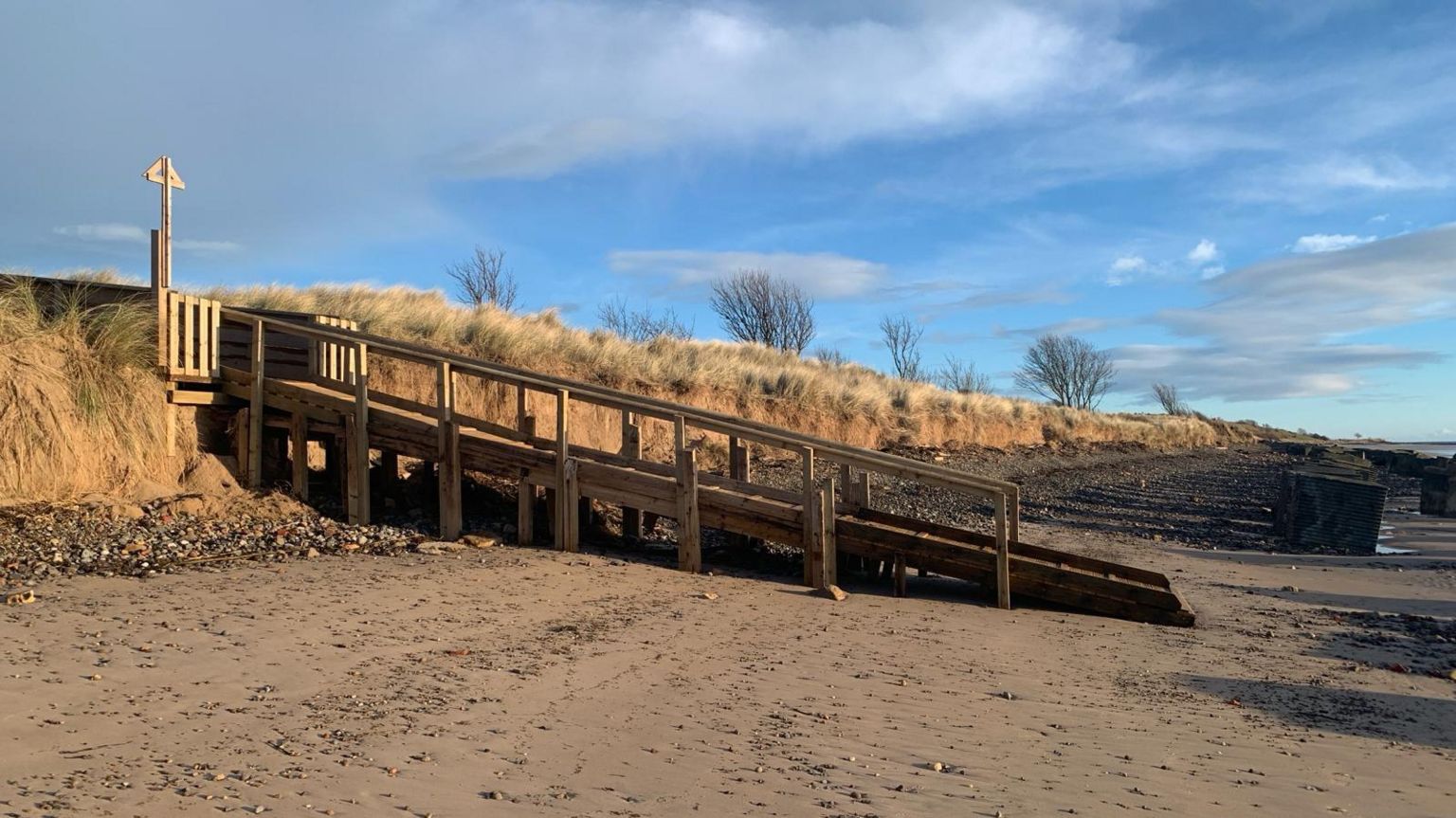 A new walkway onto a beach 