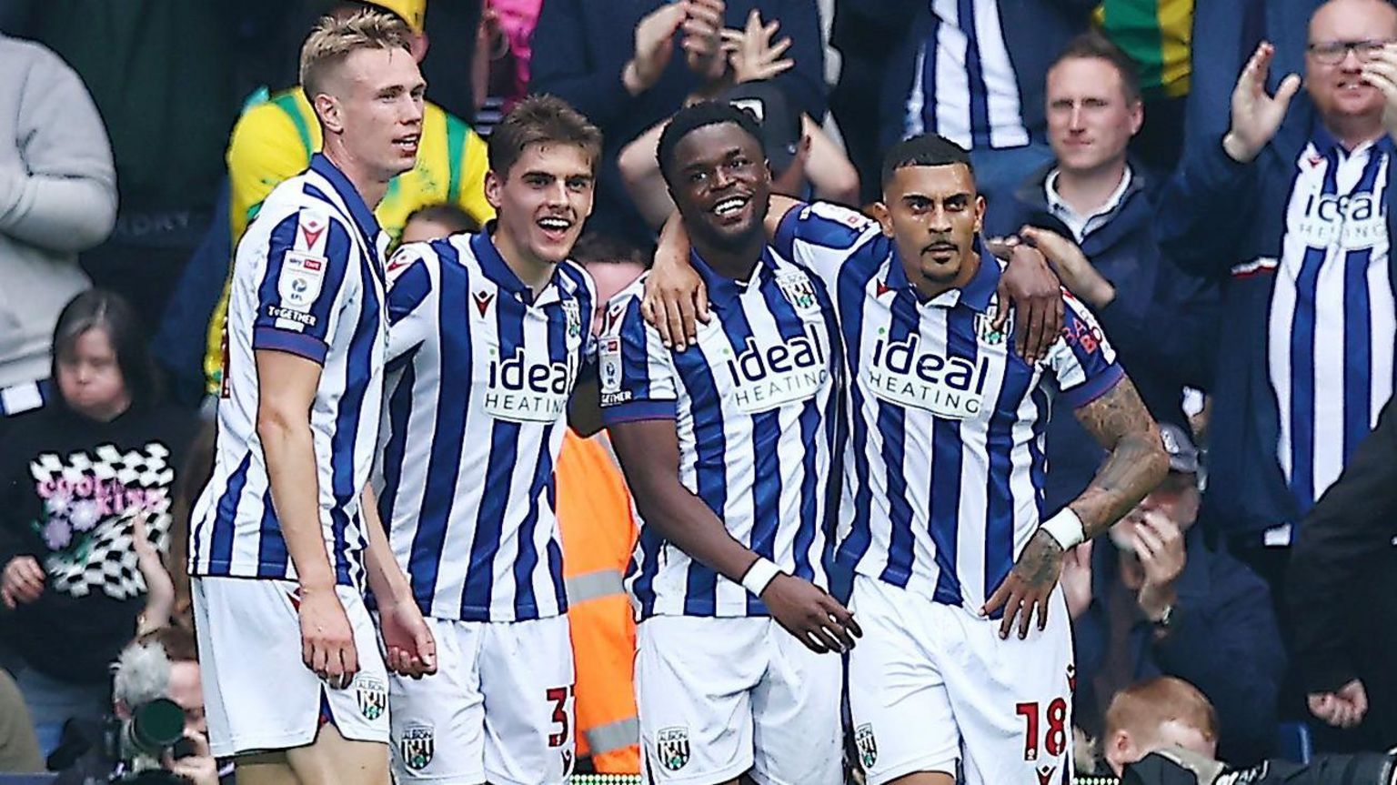 Four West Bromwich Albion players celebrating a goal during the game against Plymouth Argyle.