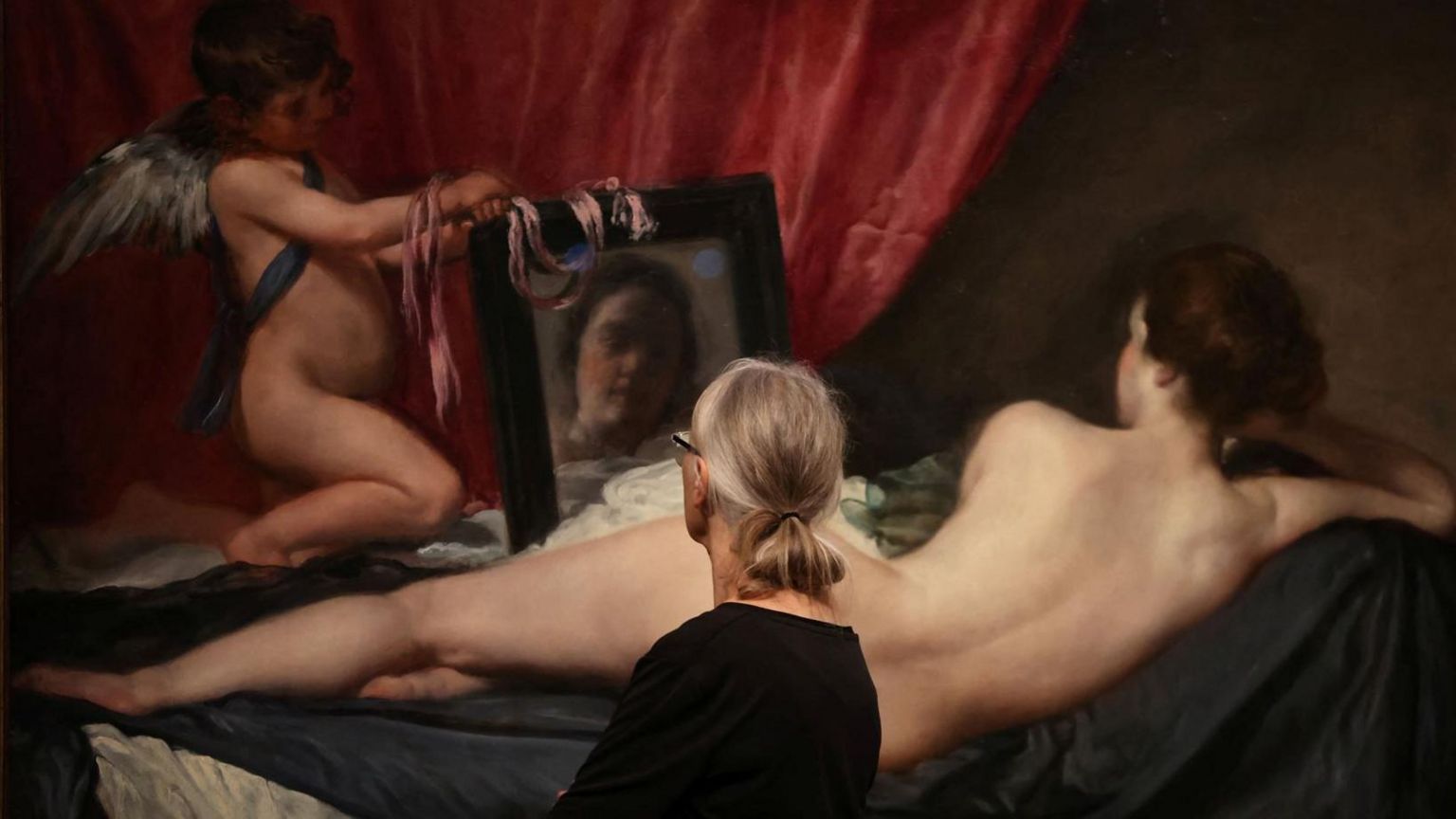 A visitor looks at Diego Velazquez's The Rokeby Venus