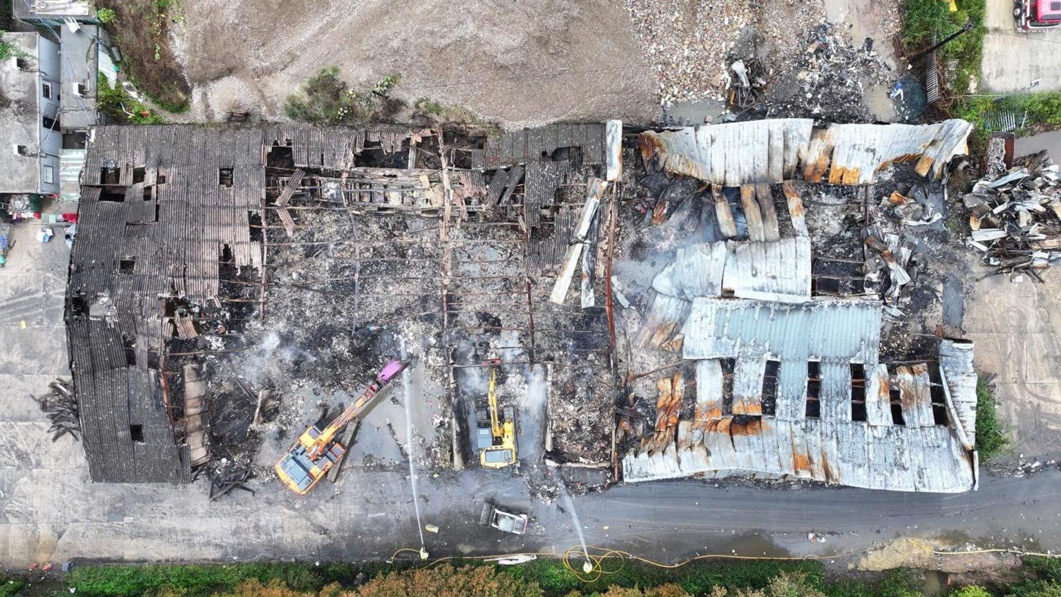 An aerial view of the burnt building showing an bird's eye view from above.