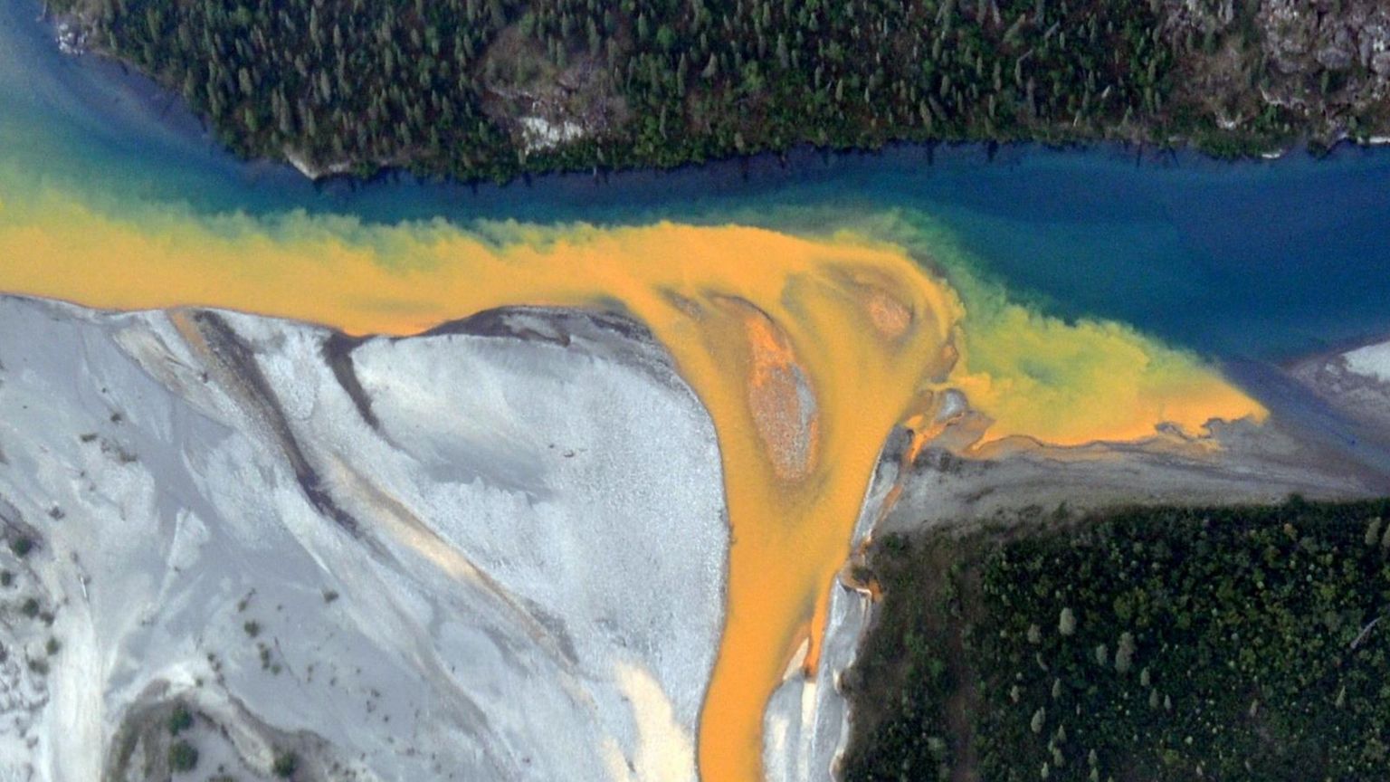 Climate change: Why are rivers in Alaska turning orange? - BBC Newsround