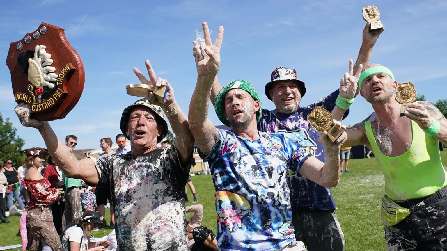 कैमरे के लेंस से They smash cakes in faces for charity.