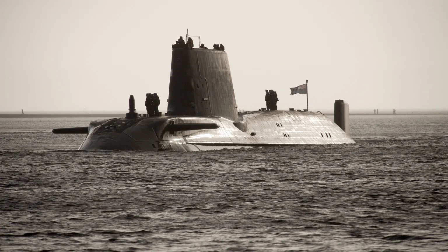 MOD Nuclear submarine HMS Astute moving towards its base at Faslane
