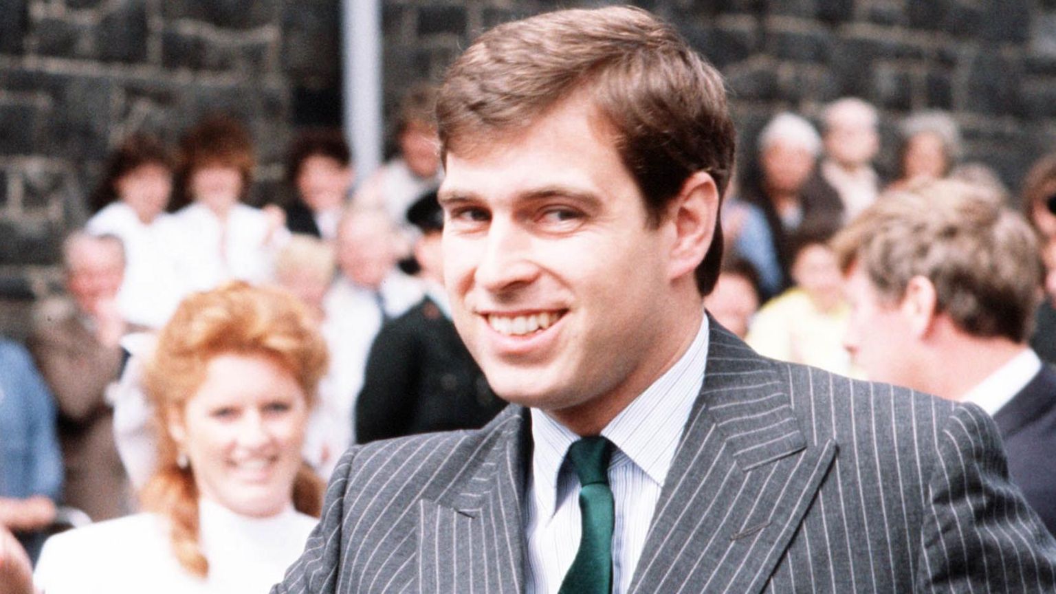 Prince Andrew pictured in Northern Ireland during a visit in 1986. His then wife Sarah Ferguson is in the background