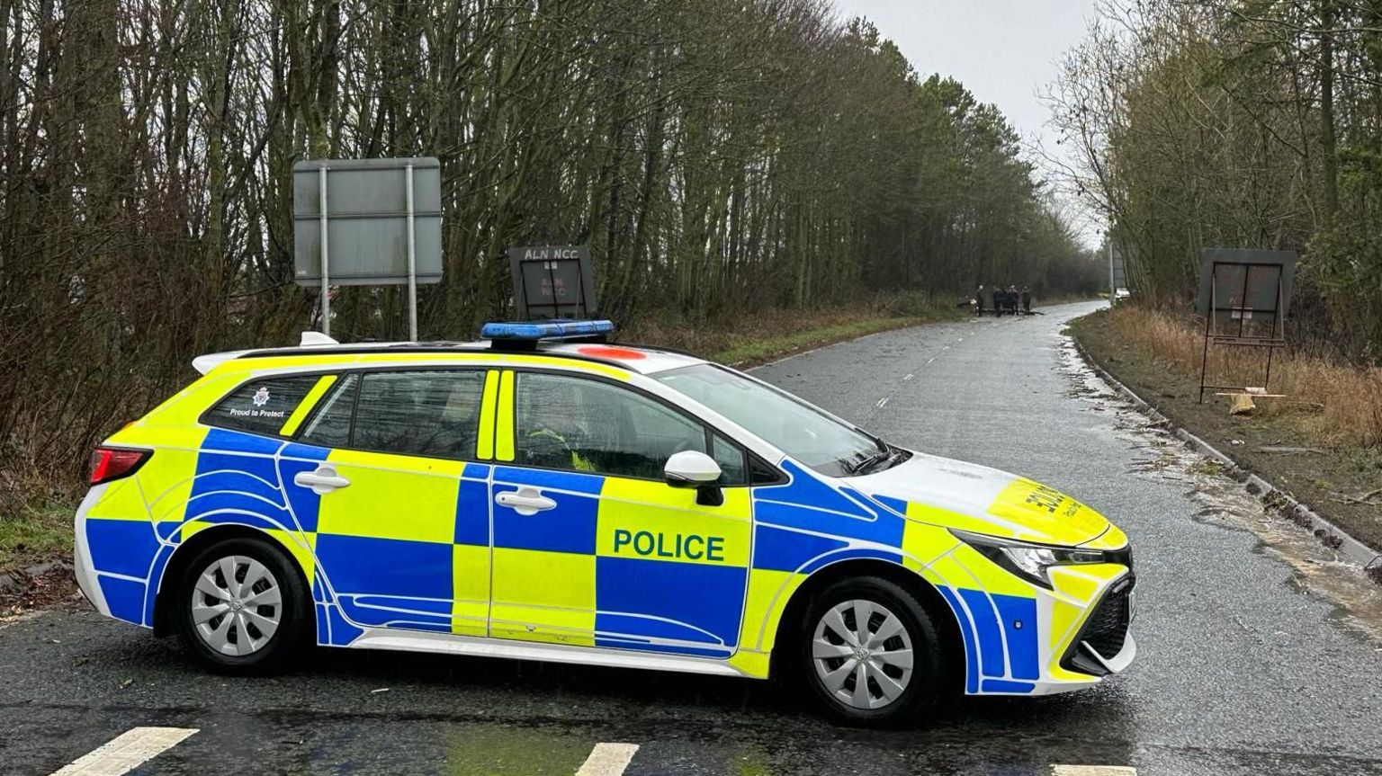 Police car on the A1068, where the incident happened