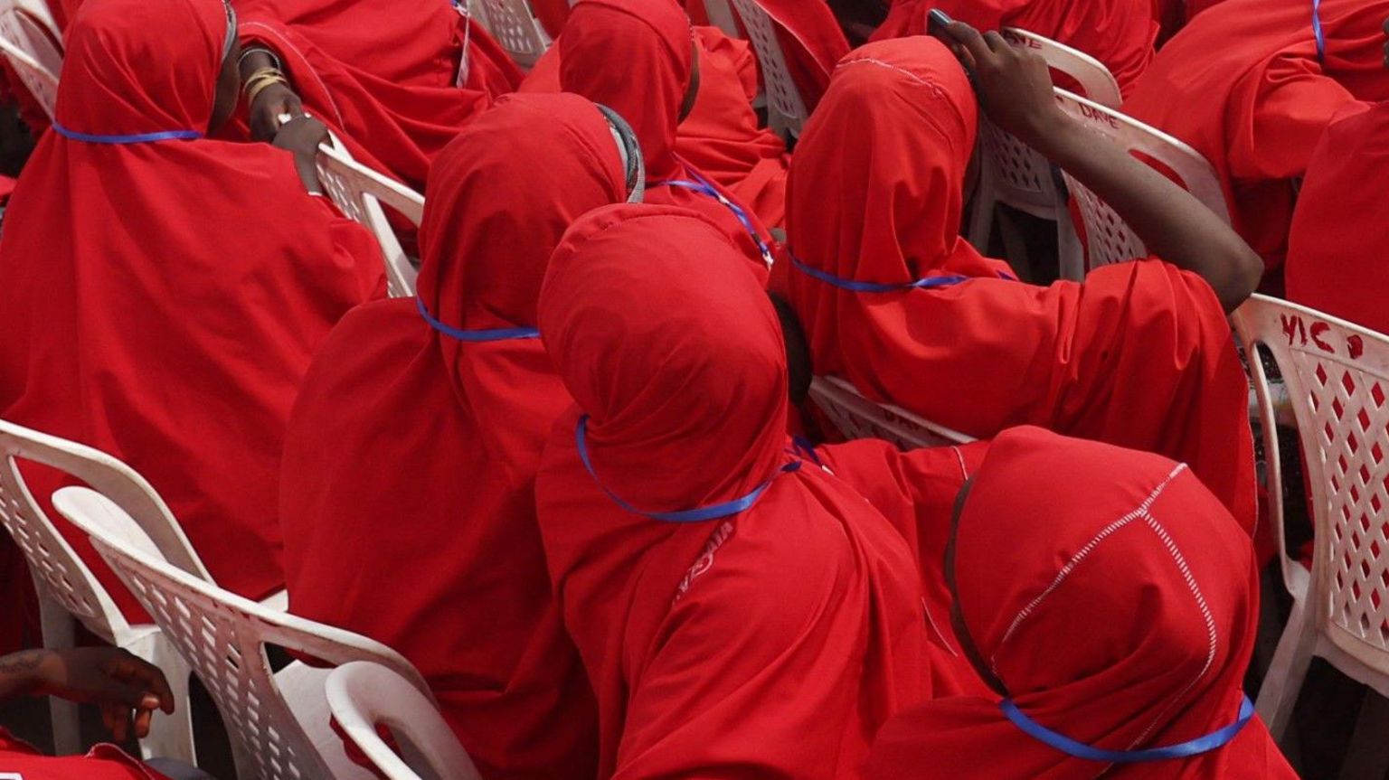 Couples sit at the venue of a wedding reception at the Kano state governor's office after taking part in a mass wedding at the central mosque in Kano city, Kano State Nigeria on October 14, 2023.