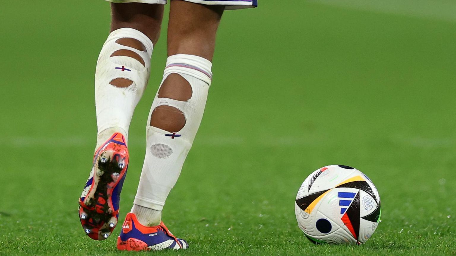 Euro 2024: Bellingham, Saka and Gallagher wear socks with holes - BBC ...