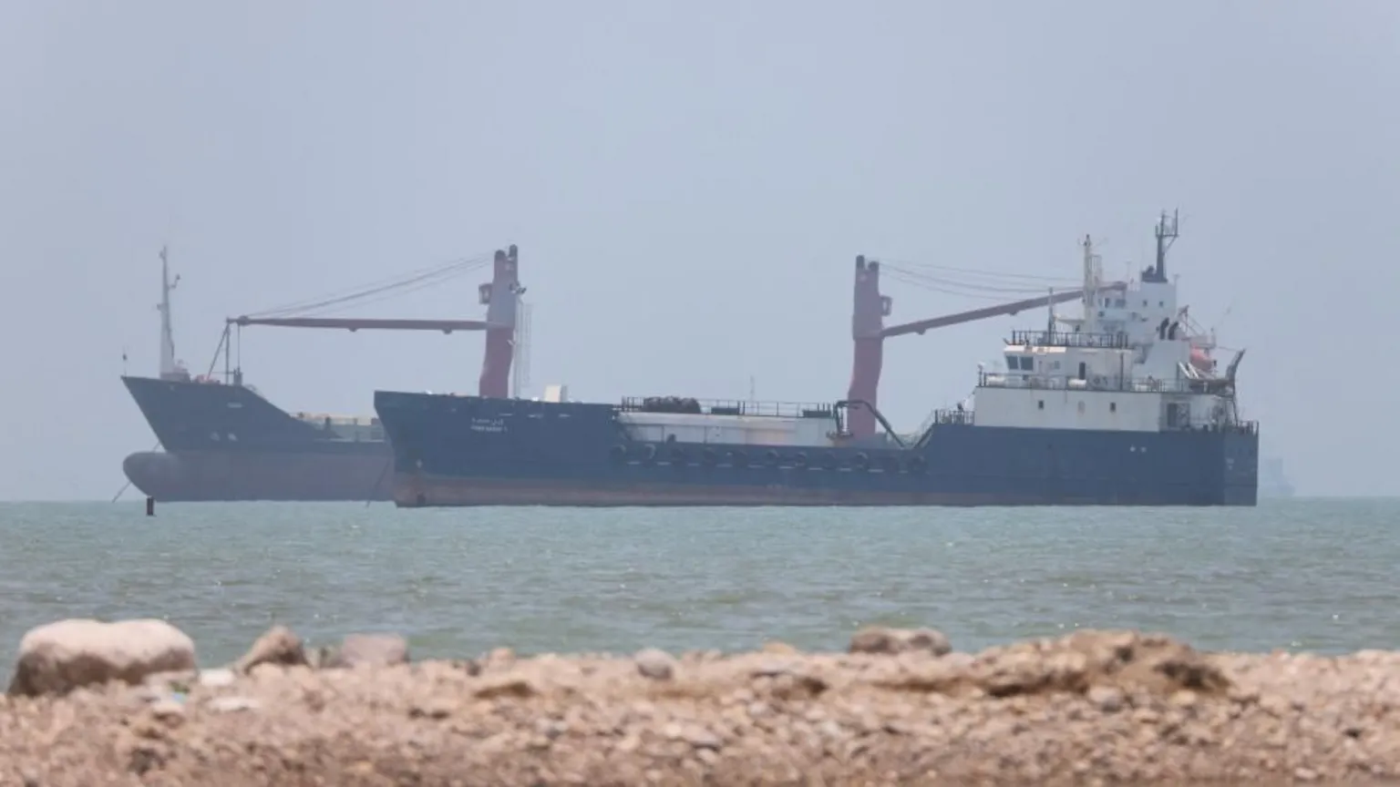 Reuters Two ships seen in the Strait of Hormuz off Iran's Bandar Abbas