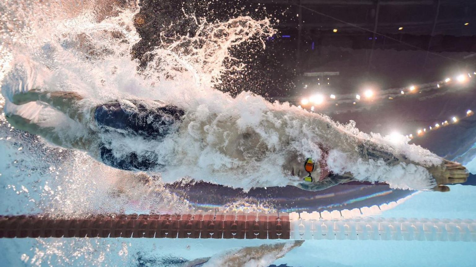 Adam Peaty swimming at the Paris 2024 Olympics in the Men's 100m Breaststroke Final - Paris La Defense Arena, Nanterre, France - July 28, 2024