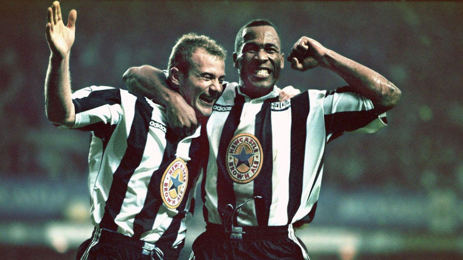 Newcastle's Alan Shearer (left) and Les Ferdinand celebrate a goal in a 5-0 win over Manchester United in October 1996