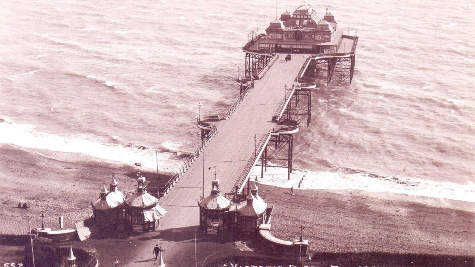 A black and white photograph of Folkestone Pier