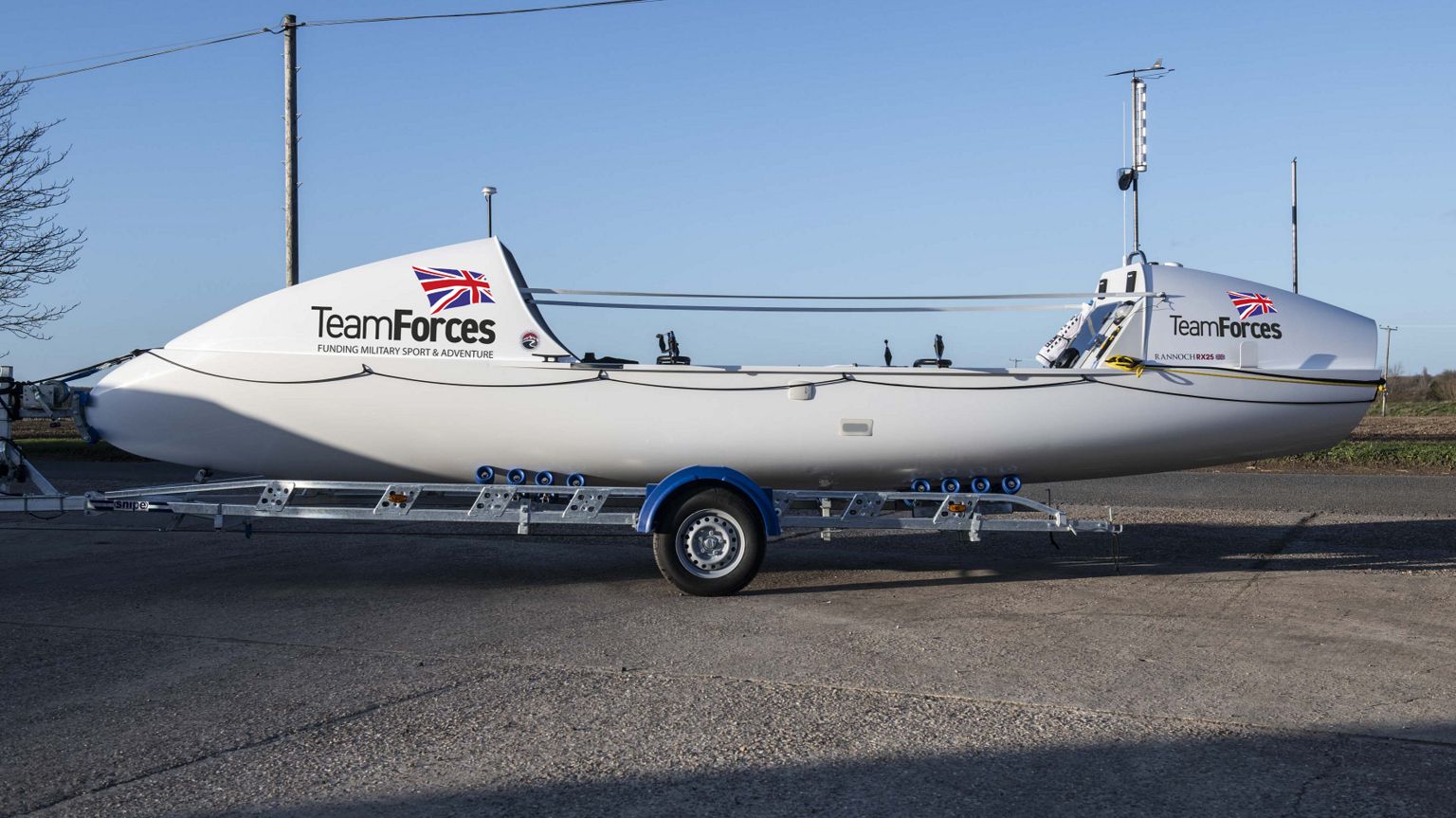 White ocean rowing boat with Team Forces branding