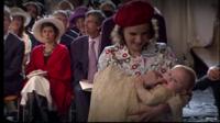 Inés Zorreguieta holding her baby niece at her christening (2007)