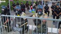 Police kneel in solidarity with protesters