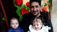 Abdul Hamid Youssef with his twins before the attack