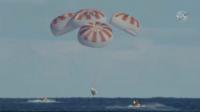 SpaceX Dragon capsule splashes down