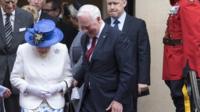 Britain's Queen Elizabeth II (C) leaves Canada House with Governor General of Canada David Johnston (2-R) and Canadian High Commissioner to the United Kingdom Janice Charette (2-L) in Central London, Britain