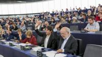 MEPs voting during a European Parliament plenary