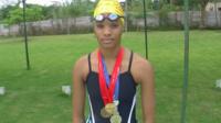 Donata Katai wearing gold medals