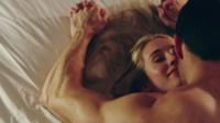 Woman lying in bed