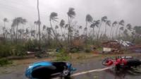 Cyclone with scooters on the ground