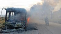 Aleppo battle: Rebels burn Syria evacuation buses