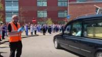 Staff salute surgeon Sadeq Elhowsh