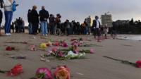 Family and friends meet at dawn on a Sydney beach to mourn the passing of Justine Damond, an Australian woman fatally shot by US police.