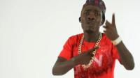 Lal Daggy signing in music video