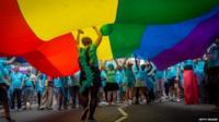People take part in the annual Pride in London parade