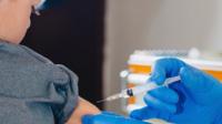 A boy being vaccinated