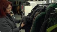 Designer Rebecca Bradley with fur coats