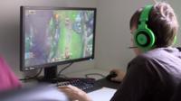 A gamer on a computer