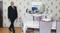 President Ilham Aliyev inspects one of the apartments