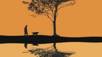 man walking dog